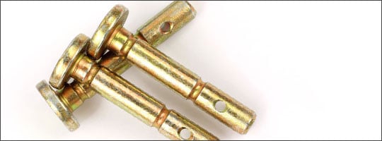 A group of three shear pins